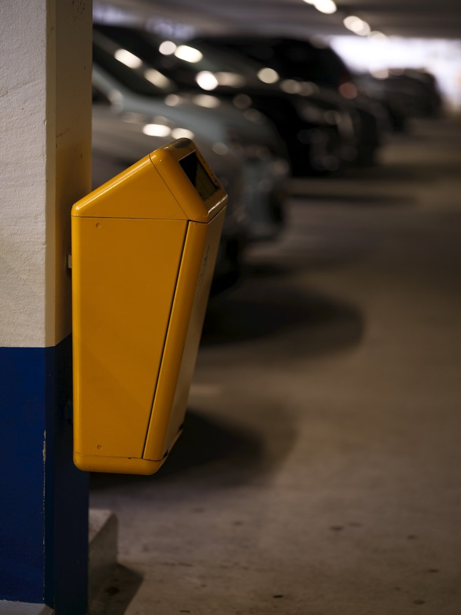 A parking garage filled with lots of parked cars